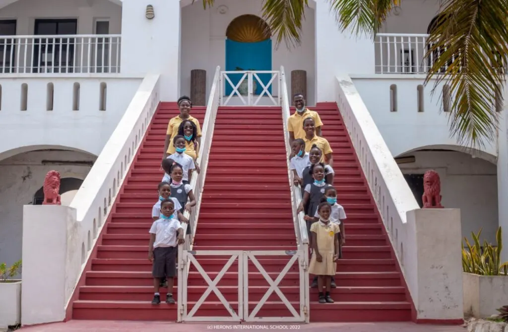 Herons students on campus steps