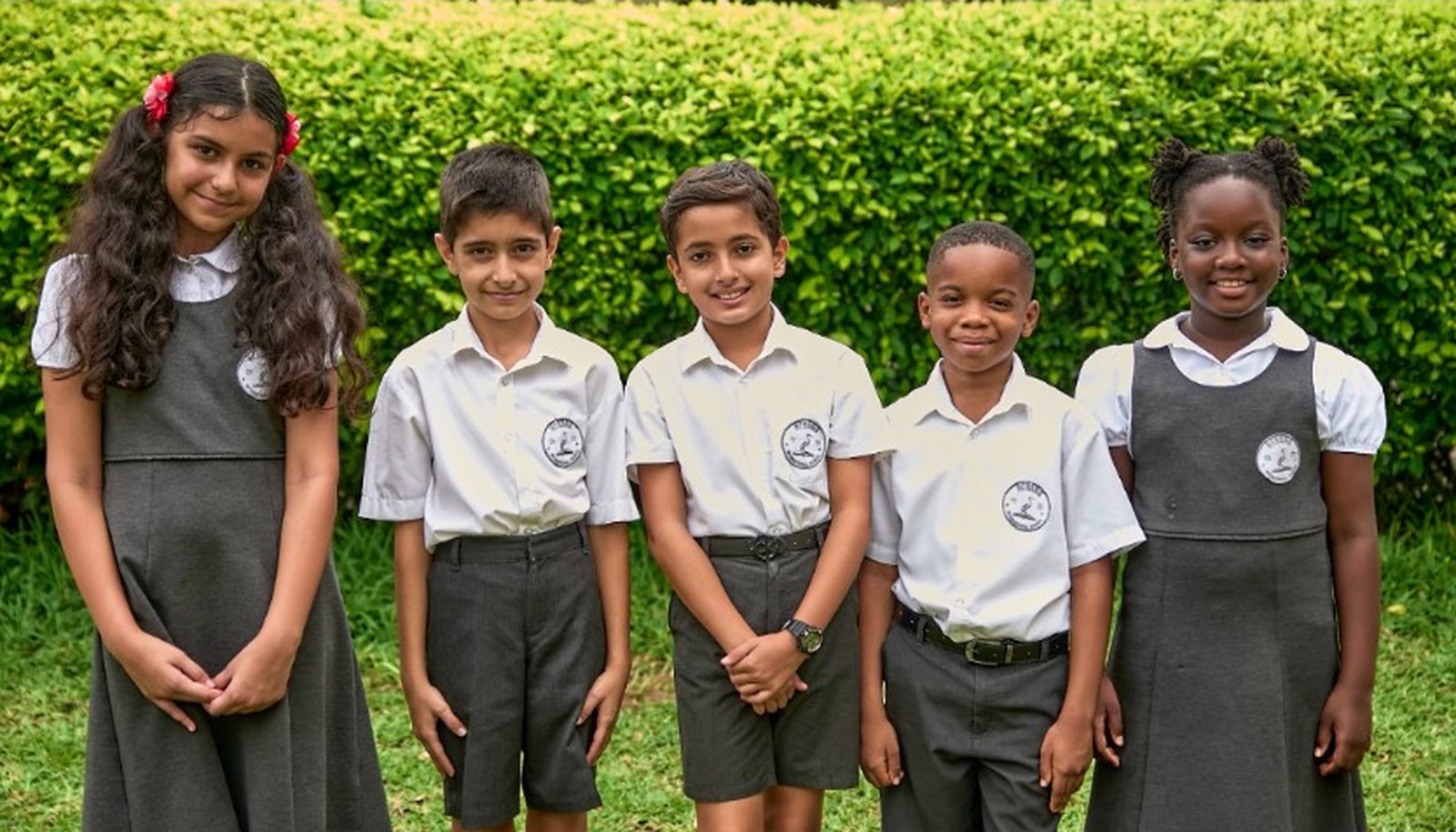Herons pupils in school uniform on campus